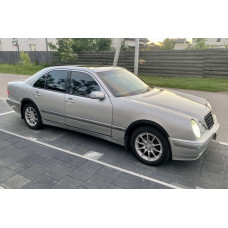 Накладки на арки (4 шт, чорні) для Mercedes E-сlass W210 1995-2002 рр